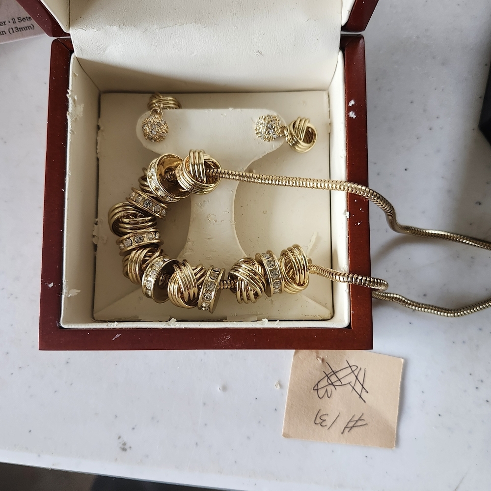 Gold toned and crystal necklace and earrings set